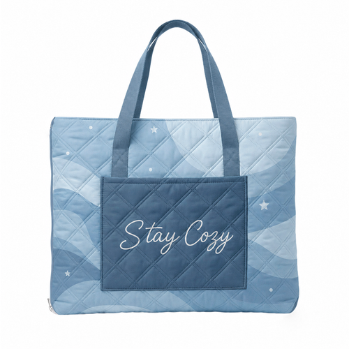 Navy Stay Cozy padded outdoor blanket folded into its built-in tote
