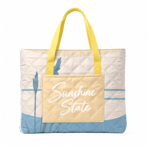 Ocean Sunshine State padded beach blanket folded into its built-in tote