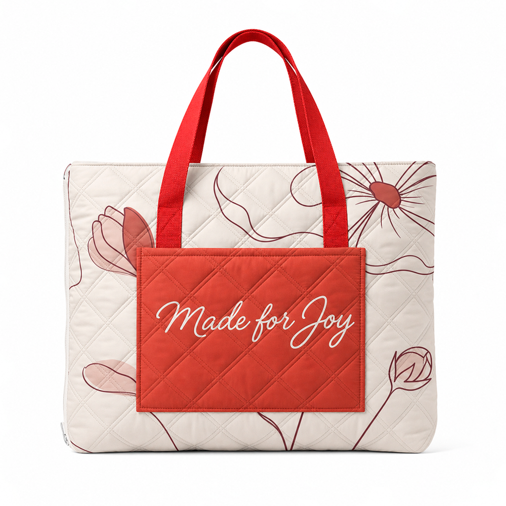 Red padded beach blanket folded into a built-in tote